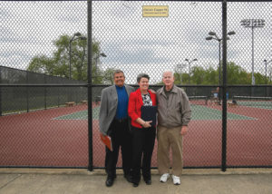 Christy Copper with her coach, Ed Hegmann, and her father, Walter L. Copper.