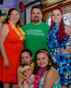 Rich Specht, center, is pictured with wife Samantha, left, and daughters Abigail, Lorilei, and Melina. ReesSpecht Life board member Melina Draht is on the right.