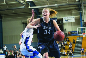 Senior Brianne Comden leads the UMW to a victory in the first round of the NCAA Division III tournament in March. (Photo by Susan Spencer)