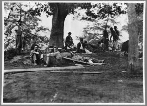 Wounded soldiers convalesce under shelter of the Brompton Oak in May 1864. This famous photo is in the collection of the Library of Congress. 