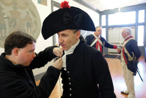 James Monroe (James G. Harrison III) gets help with his very 21st-century microphone before the ceremony. (Photo by Norm Shafer)