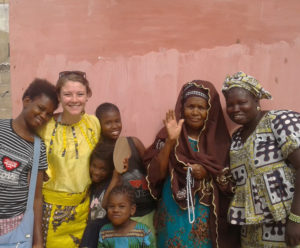Maura Slocum is an agroforestry volunteer for the Peace Corps in Senegal. She’s shown here with her host family.